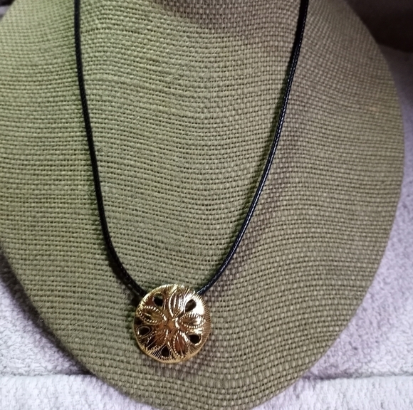 Goldtone sand dollar on black cord necklace - Picture 2 of 4